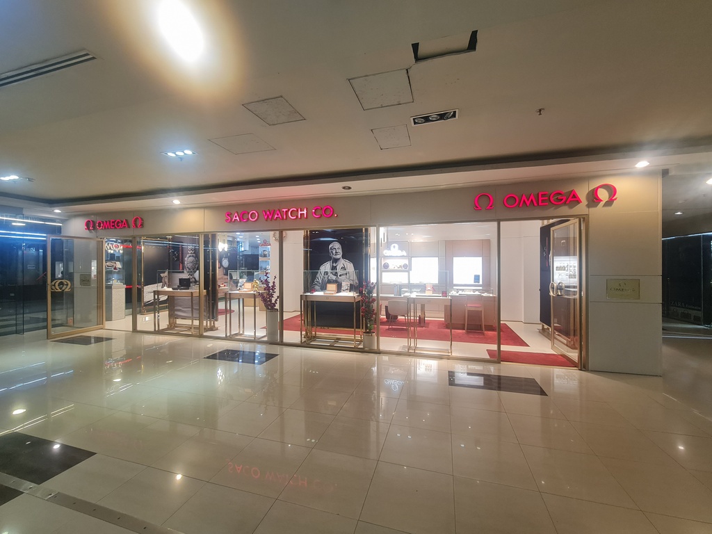 A watch movement being assembled by a watchmaker.